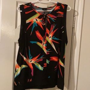 Ladies sleeveless super comfy and bright top.